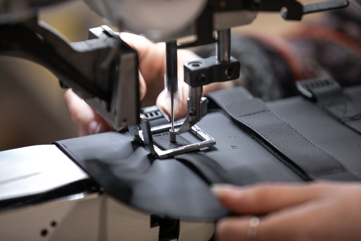 close up of sewing machine in the restrap factory