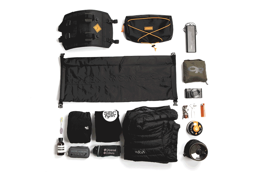 animation of restrap bar bag being packed with camping gear