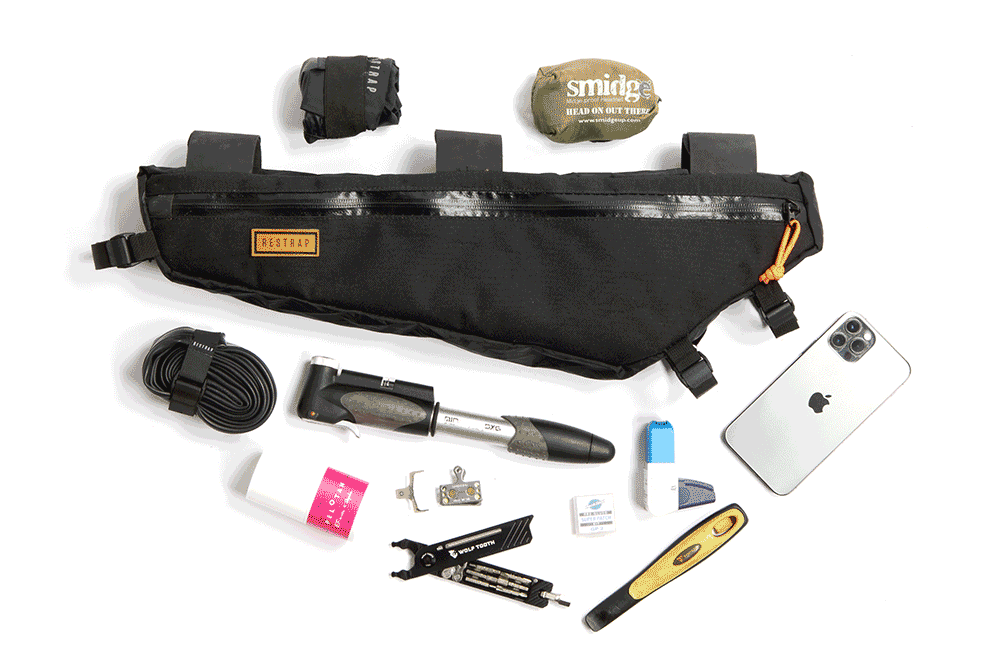 animation of restrap frame bag being packed with various gear, mainly spares and mechanical items