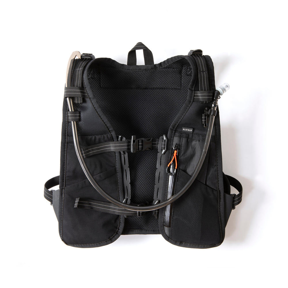 Front of the Restrap race hydration vest on a white background, showing the straps and zip compartment