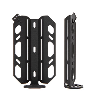 A black laser cut aluminium cargo cage mounted to the fork of a bicycle, with Restrap branded rubber label visible.