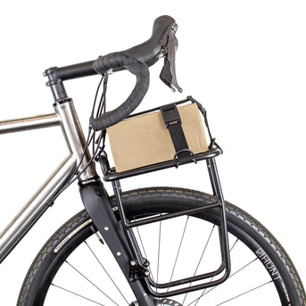 A pair of black Restrap luggage straps with rubber o-rings and magnetic buckles on a white background.