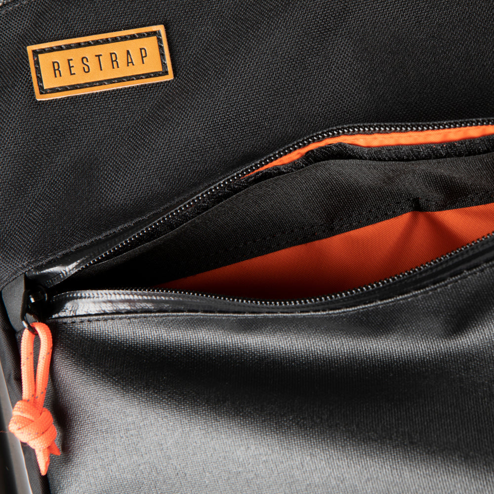 Image of the inside of a Restrap Full Frame Bag showing internal storage