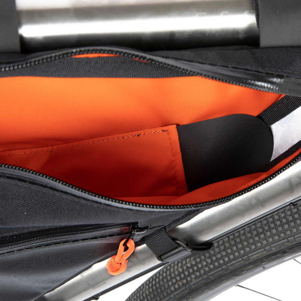 Image of the inside of a Restrap Full Frame Bag mounted on the down tube of a bicycle