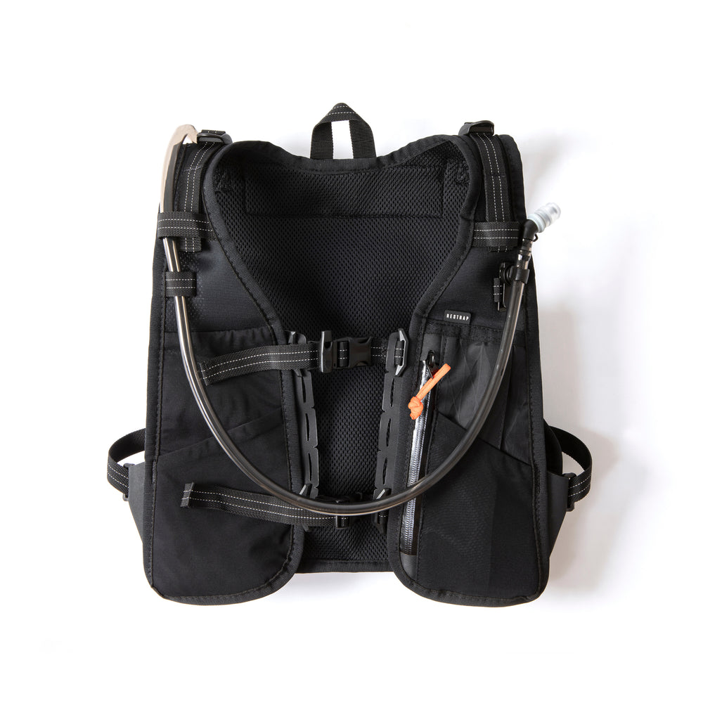 Black Restrap Rolltop Hydration Vest with hydration system on a white background