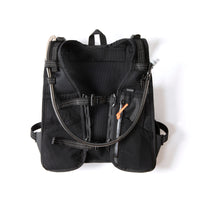 Black Restrap Rolltop Hydration Vest with hydration system on a white background