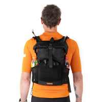 Black Restrap Rolltop Hydration Vest with hydration system on a white background
