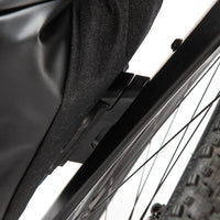 Close-up of a restrap multi mount fitting on a fork on a white background